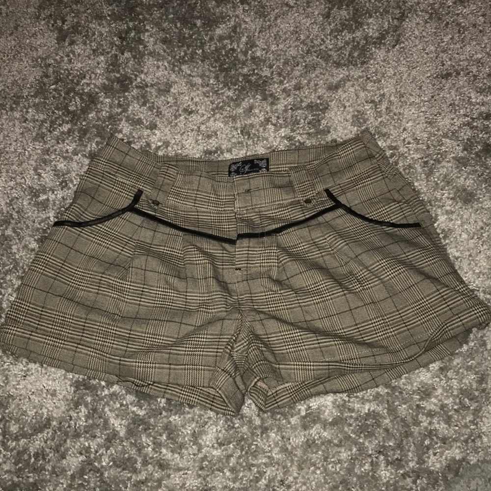 Women’s plaid black leather shorts